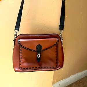 gently used, good condition. used once,twice. Fabric, leather, cork, pleather.